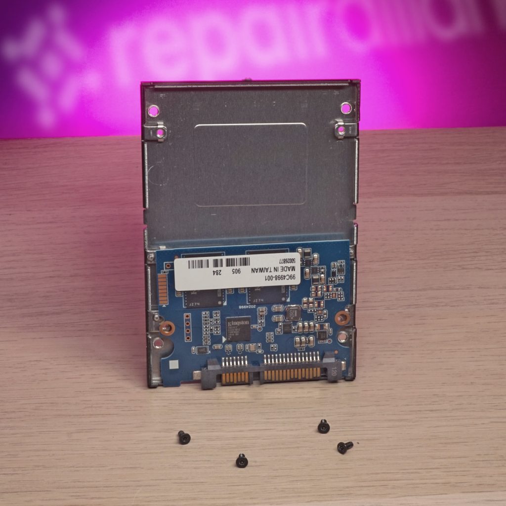 Disassembled kingston ssd sits on bench awaiting data recovery at repair alliance dundee
