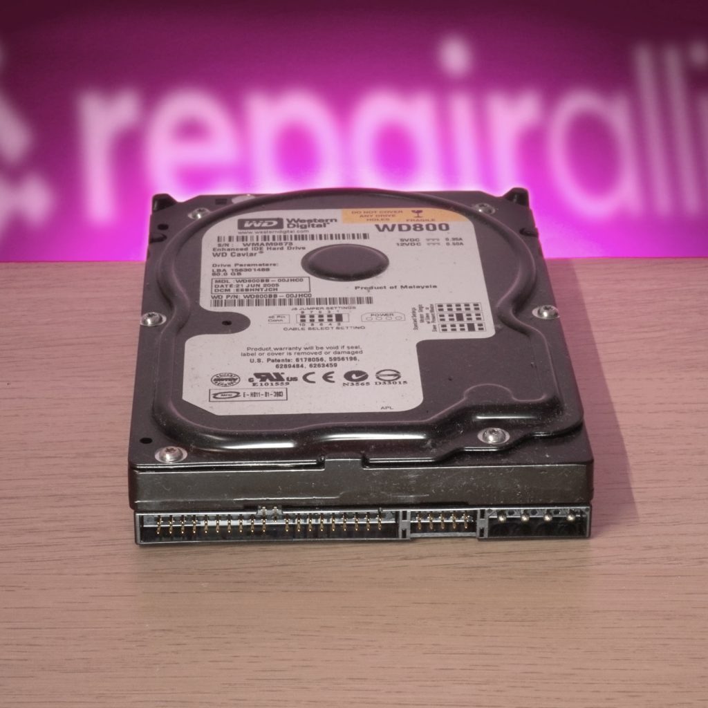 Old ide/pata hard drive on bench awaiting data recovery in dundee