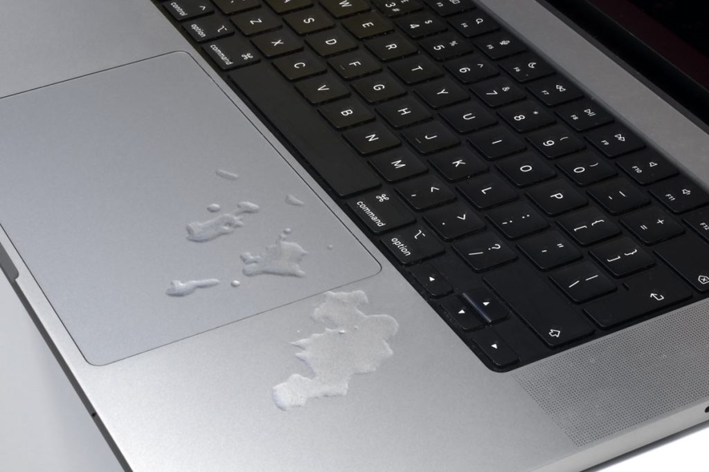 Apple macbook pro 2021 awaiting liquid damage repair