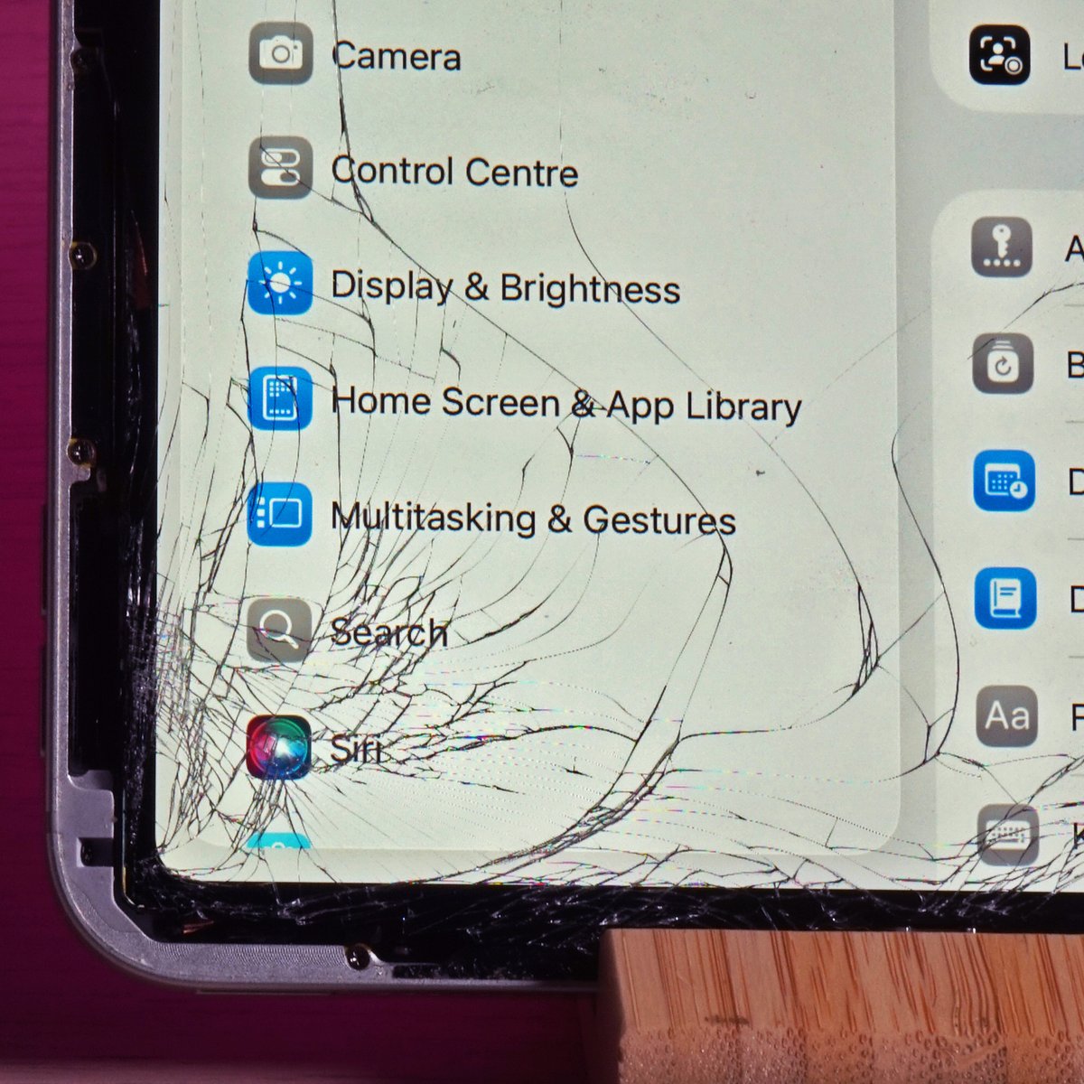 Close-up of cracked ipad screen at repair alliance dundee
